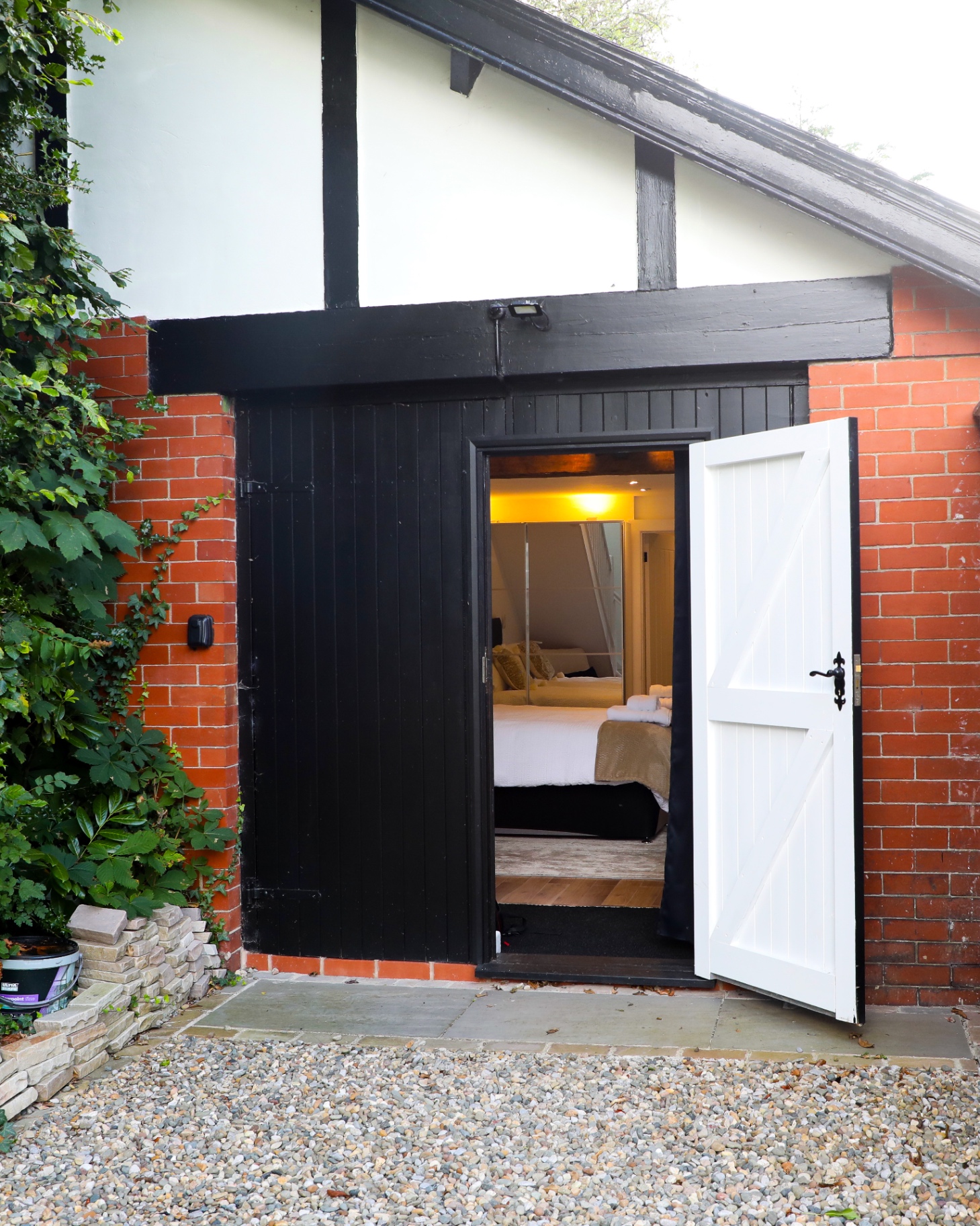 The private entrance to Broughton Park Hideaway, door open to the bedroom beyond